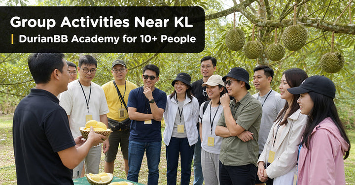 A group of people in durian farm
