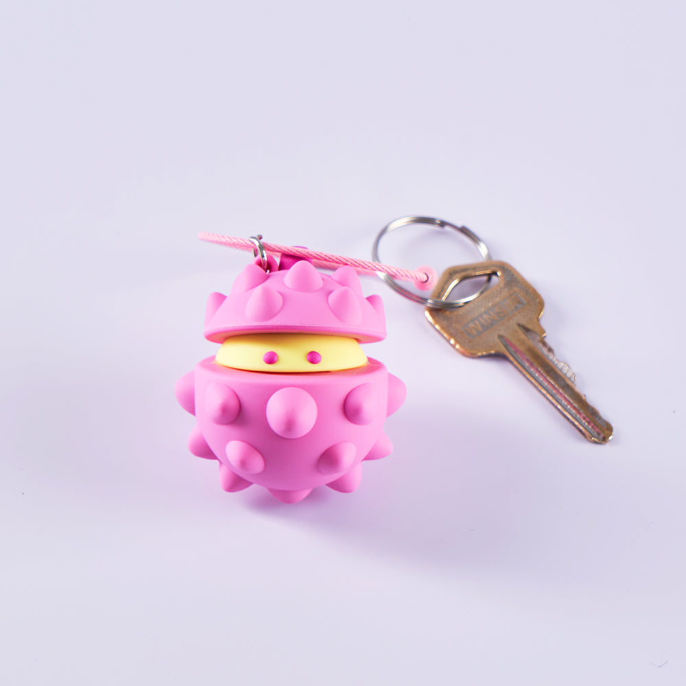 Pink Bella 3D durian keychain attached to keys for scale; keys are styling props.