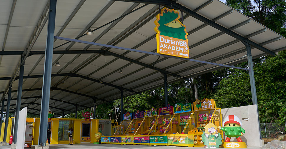 A space with DurianBB Academy signboard and carnival game machine