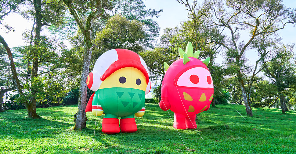 Giant-SuperB-and-Dragon mascot stand in the farm